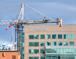 Waterproof rain suit - Deloitte building and sign in Ottawa, Canada